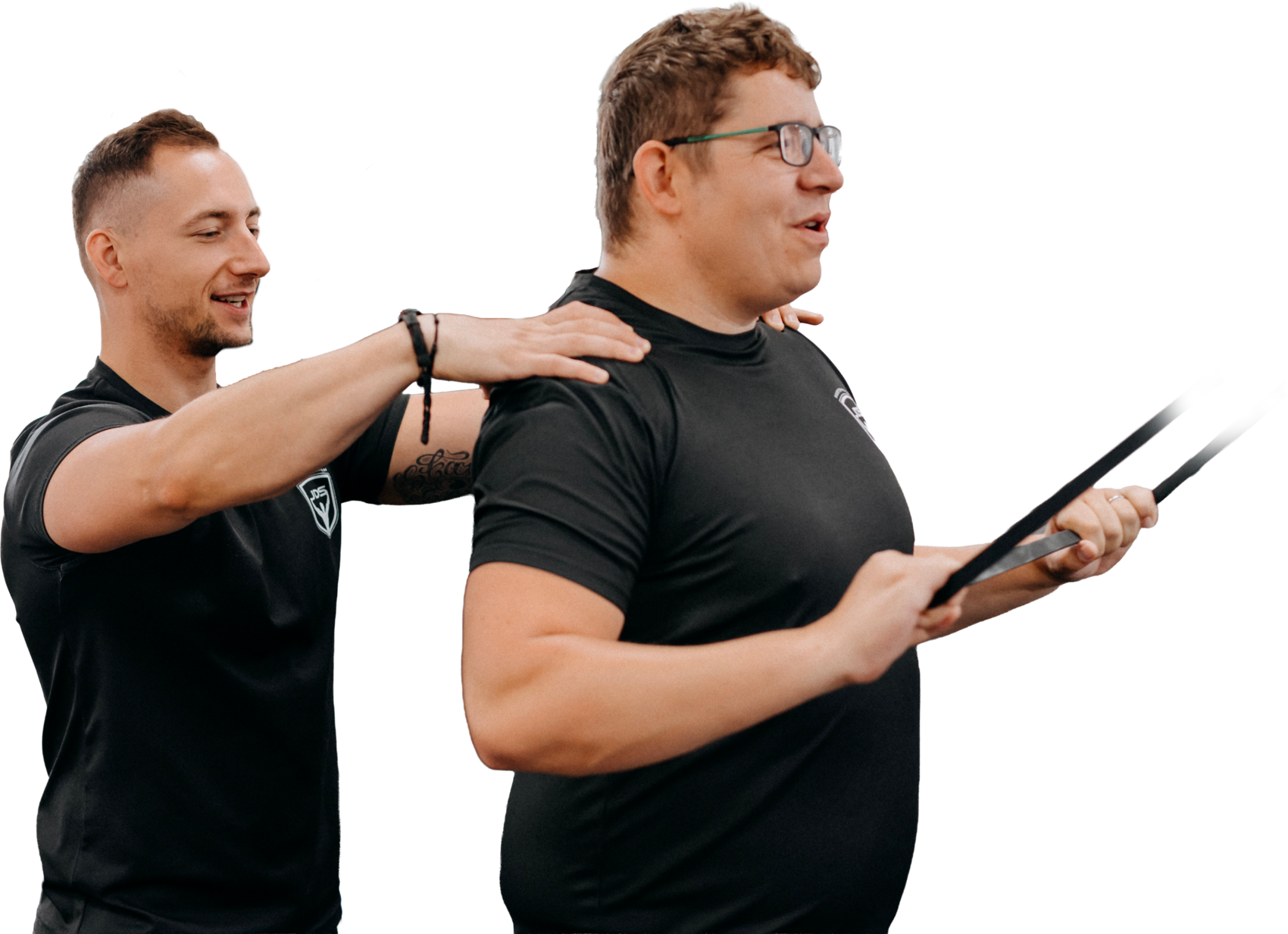 Osobní trenér s klientkou při individuálním tréninku, soukromé fitness Praha 3